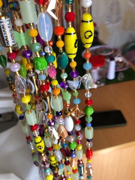 Earrings and waist beads