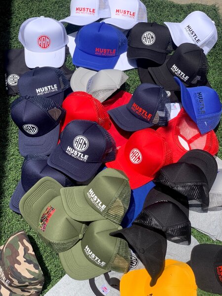 Hustle and Motivate caps k65