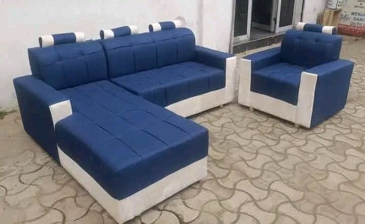 Canapé d'angle bleu avec ottomane