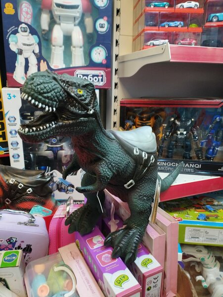 Игрушка динозавр