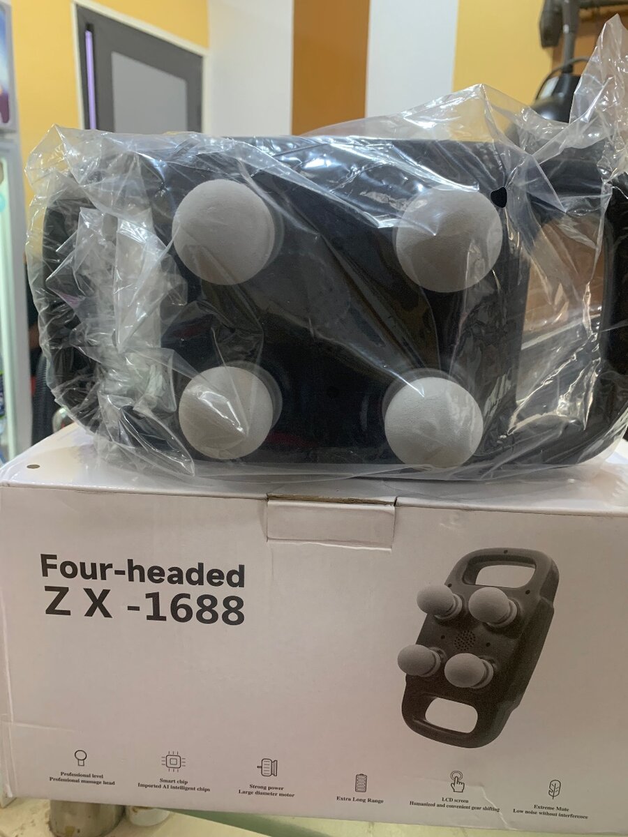 Four headed  massaging gun
