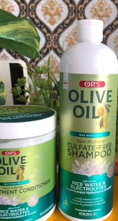 ORS olive oil max moisture super softening deep treatment conditioner.