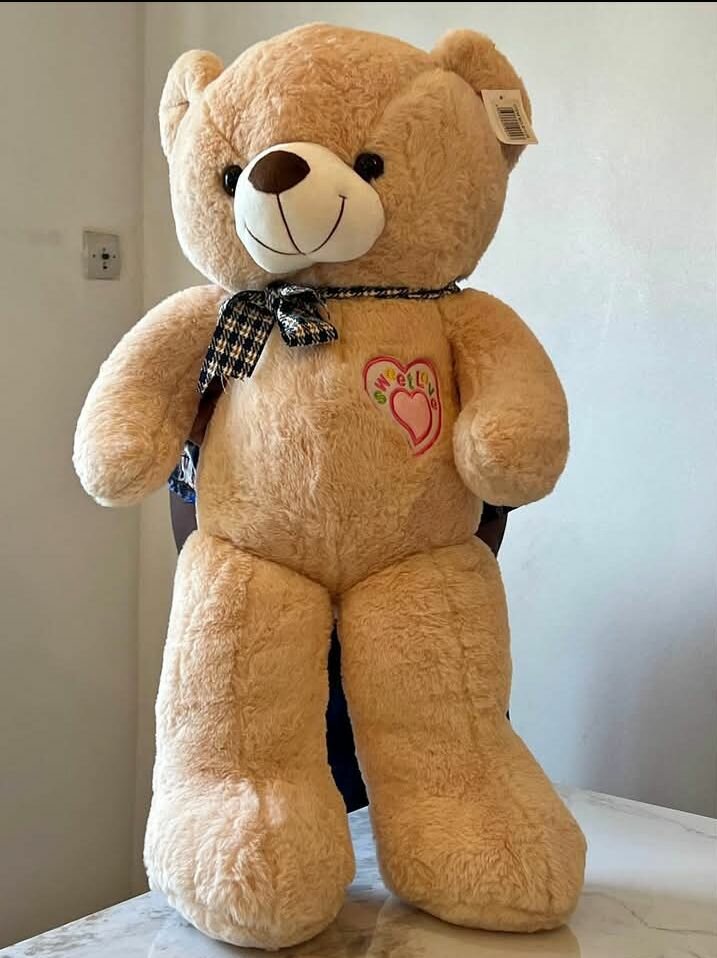 Gros ours en peluche marron