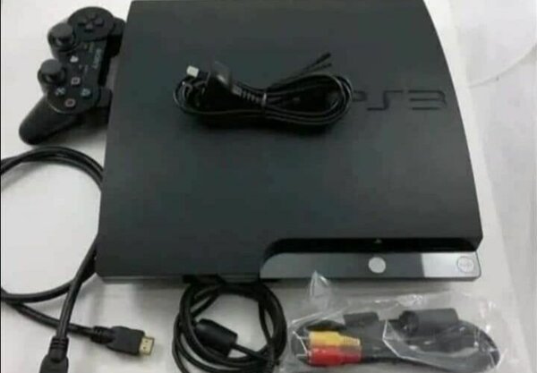 Console PS3 avec accessoires