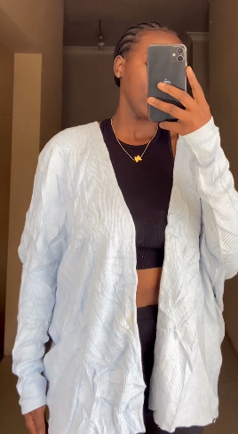 Short knitted cardigan with buttons in blue size:M/L