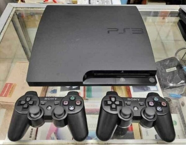 Console Sony PlayStation 3 avec 2 manettes