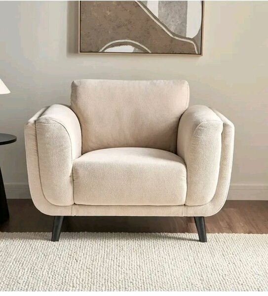 Fauteuil design en tissu beige