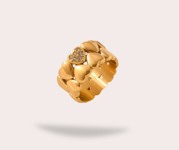 Bague en or et cœur pavé