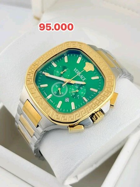 Montre luxe dorée et verte