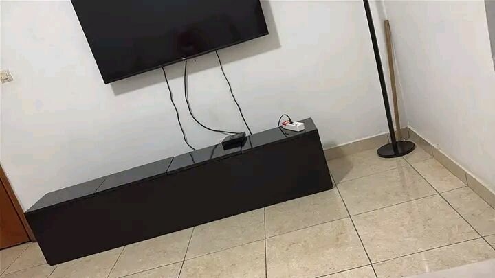 Meuble TV mural noir brillant