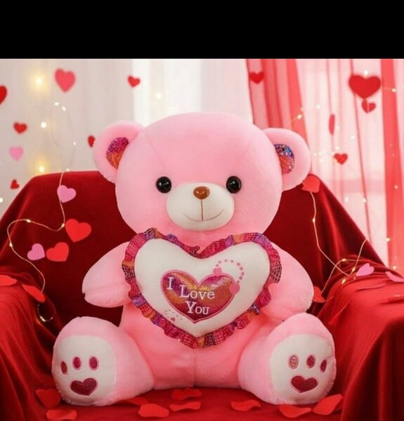 Gros ours en peluche rose avec cœur