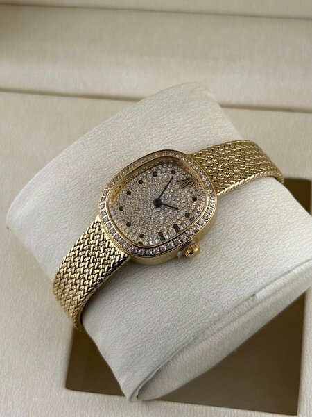 Montre femme en or et diamants