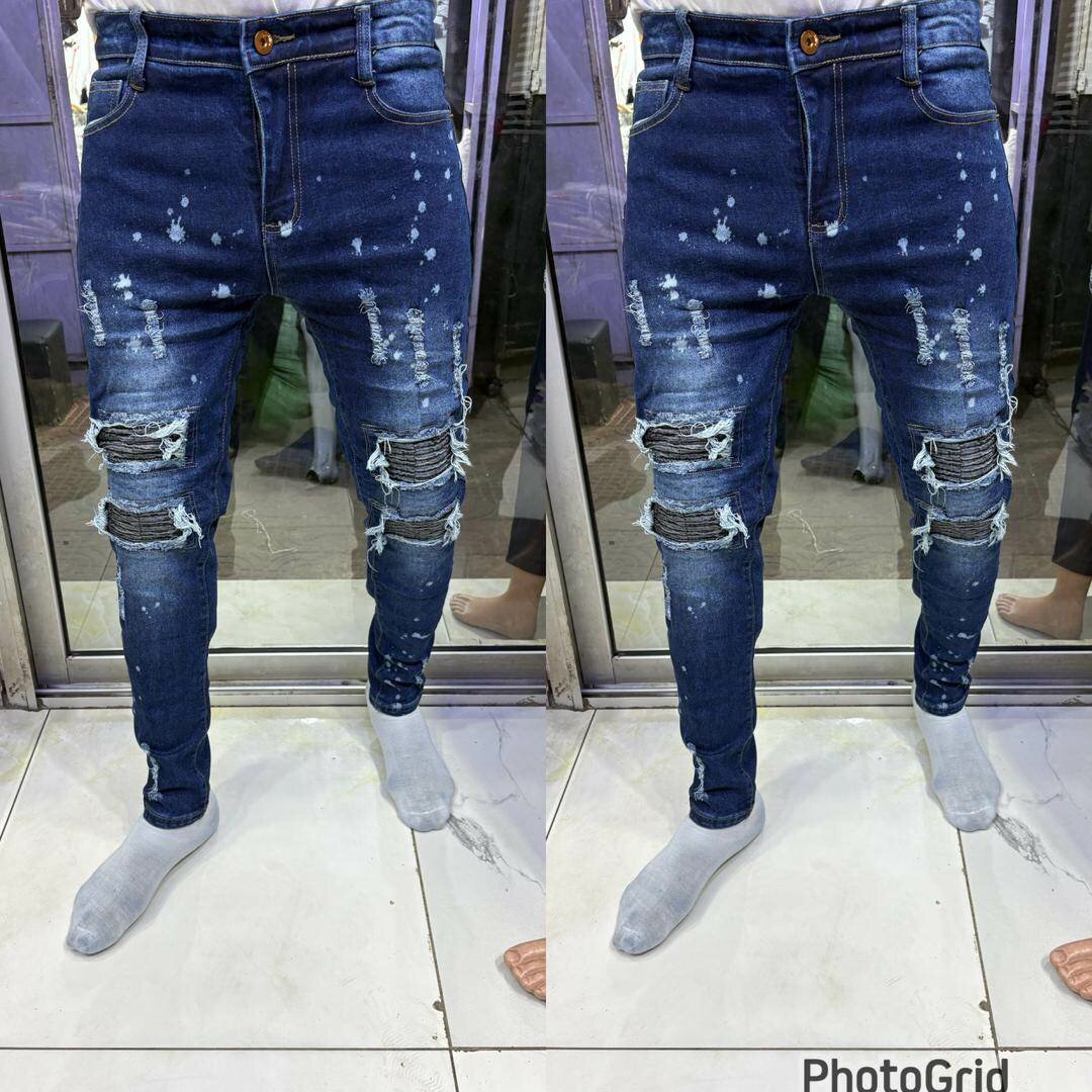 Jeans déchirés tendance homme