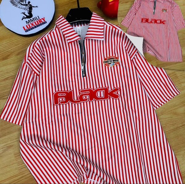 Polo rayé à fermeture éclair