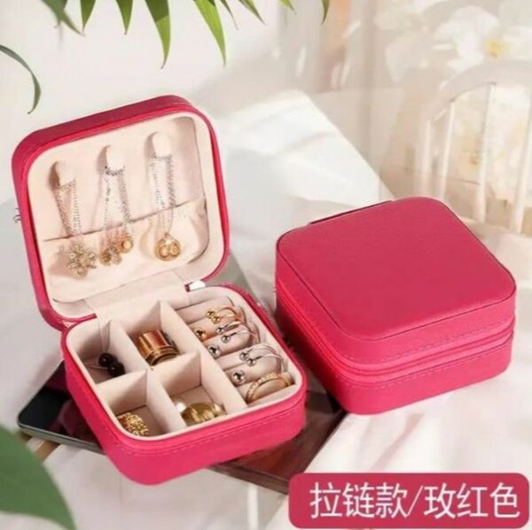 Boîte à bijoux compacte rose