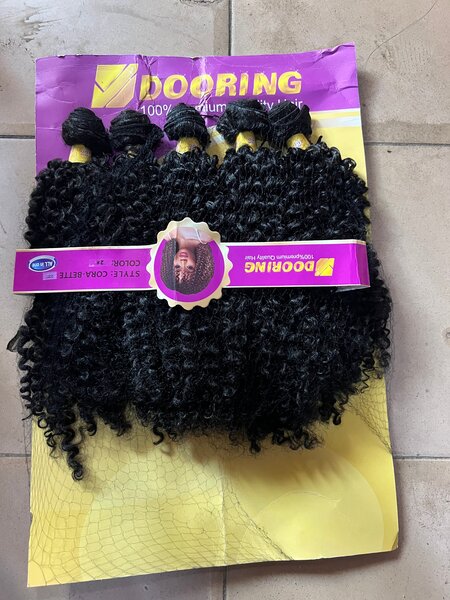 Extensions cheveux bouclés