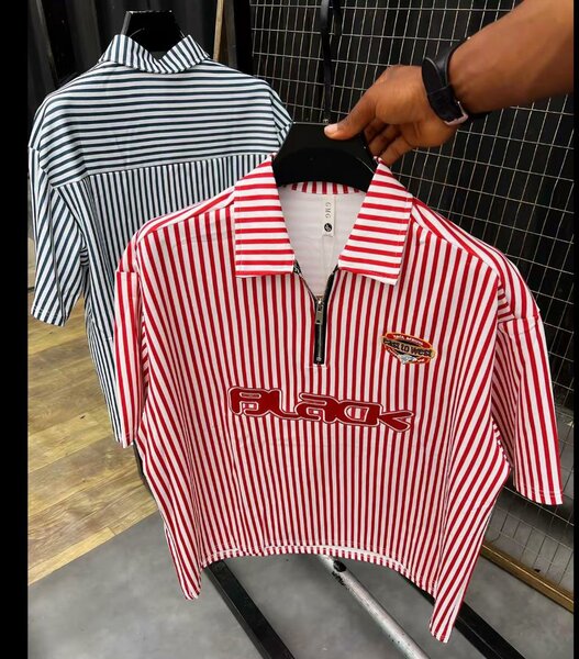 Polo rayé à fermeture éclair