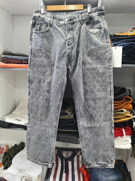 Jeans homme délavé motif géométrique