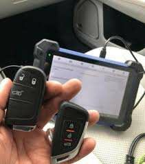 AUTOMOTIVE KEY PROGRAMMING, DECODING, AND TRACKING SYSTEM