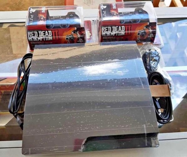 Console PS3 avec manettes