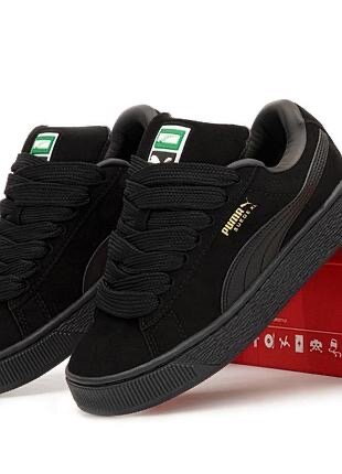 Baskets Puma Suede Noires Unisexes