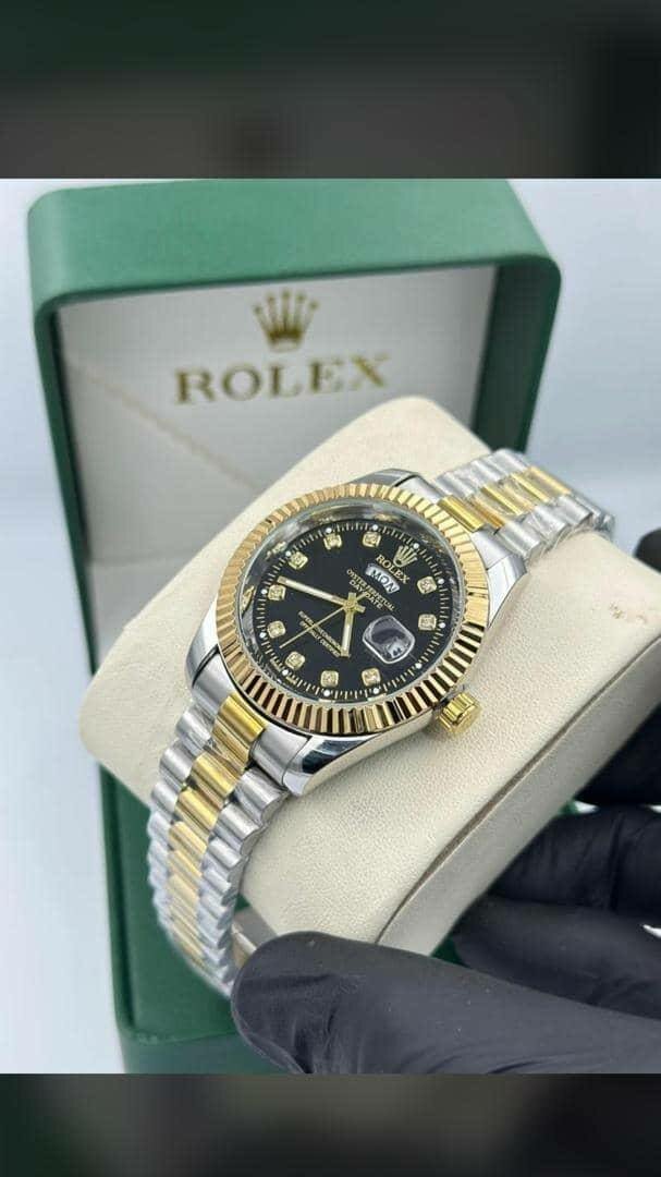 Montre de luxe en or et acier