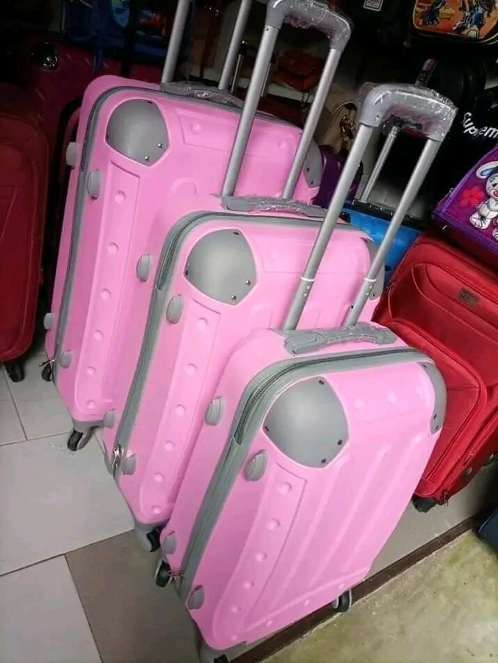 Valise rigide ABS à roulettes