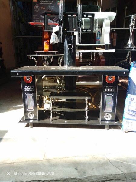 Glass Tv stand plus tv holder