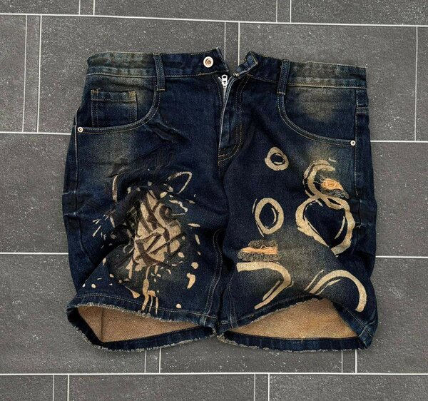 Shorts en jeans déchirés pour homme