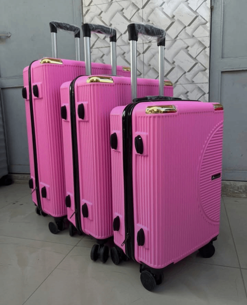 Valises roses rigides