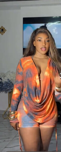 Combinaison orange et grise femme