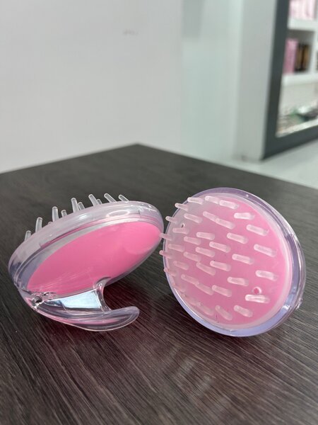 Hair massage brush.