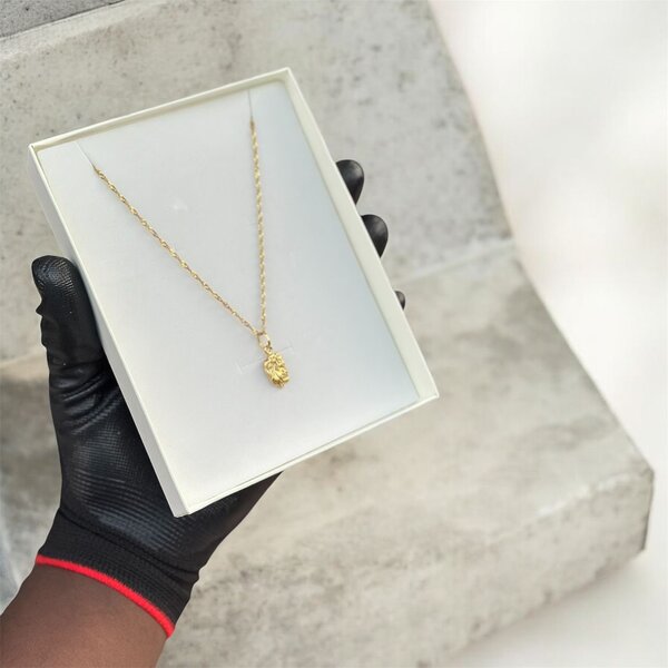 Collier en or avec pendentif diamant