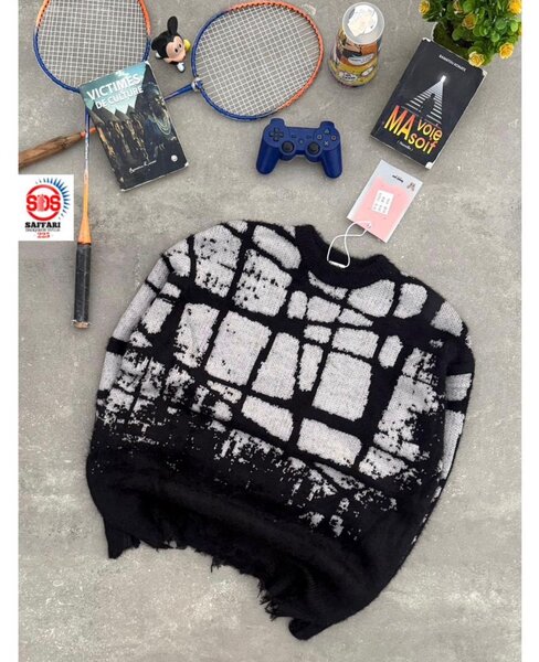 Pull homme noir et blanc à motif carreaux