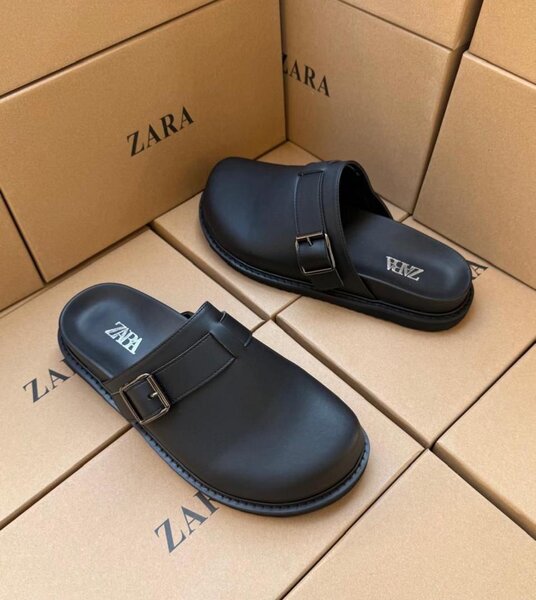 Mules noires en cuir pour homme