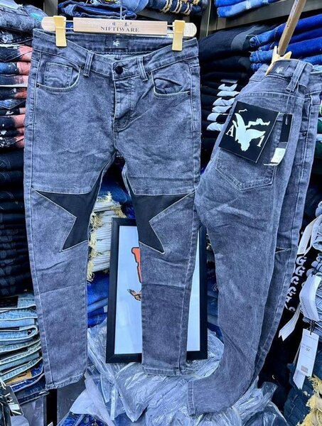 Jeans gris foncé avec étoile noire - NIKE