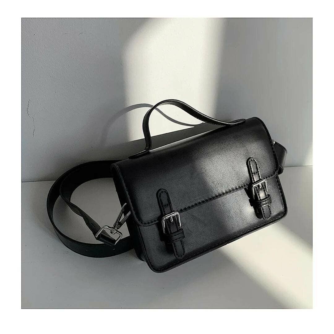 Sac à main en cuir noir