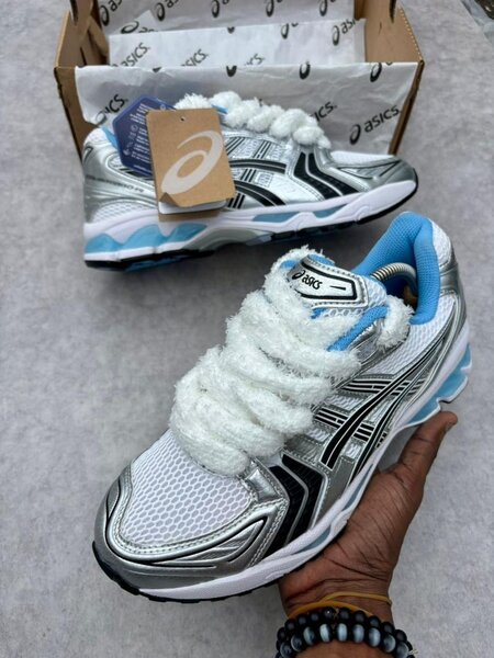 Chaussures de course Asics tendance