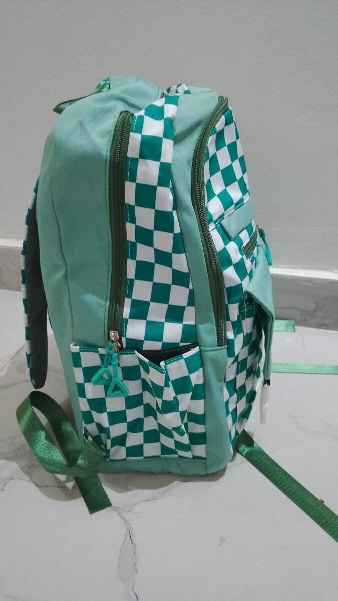 Sac à dos à carreaux tendance