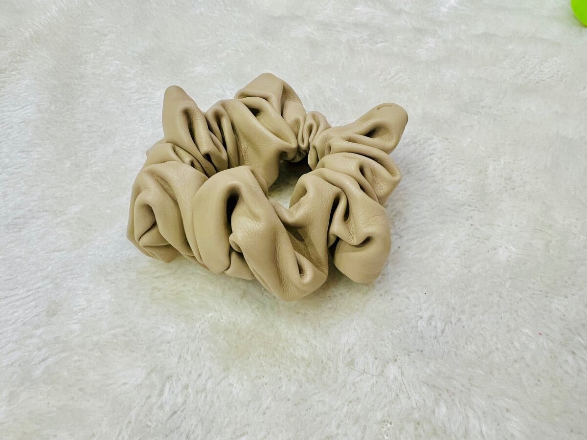 Beige color leather hIr scrunchie for girls.