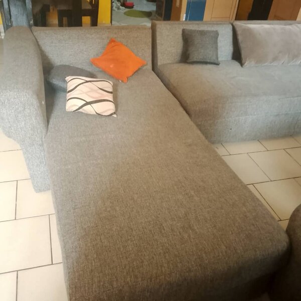 Canapé d'angle gris en tissu