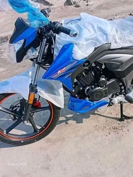 Moto RX125 bleu et noir