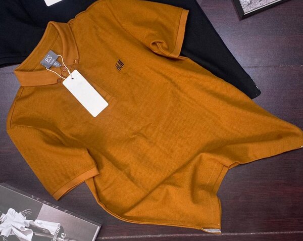 Unleash your hidden fashion potential with our latest H&M Golf T-Shirts in brown!!