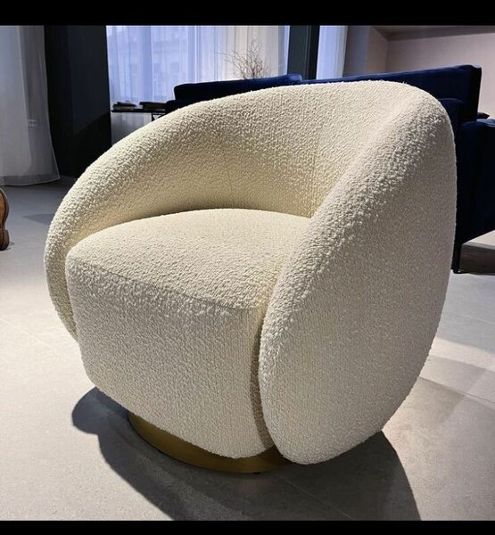 Fauteuil rotatif en tissu bouclé