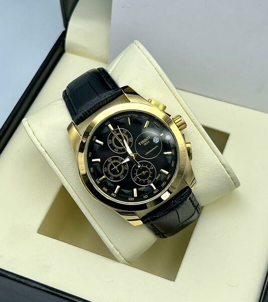 Tissot dorée fond noir+coffret