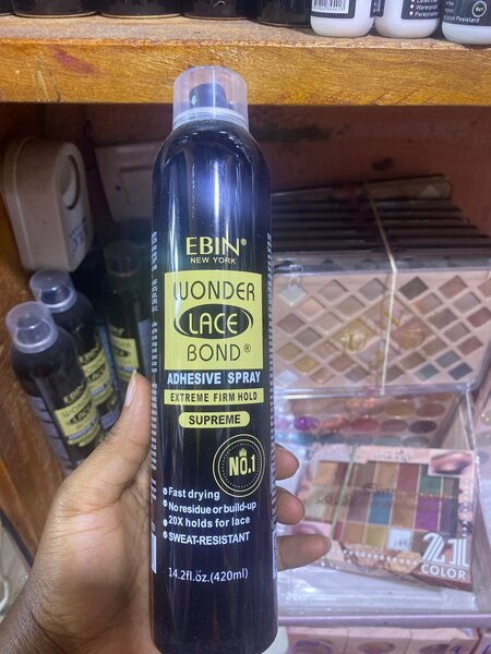 Spray adhésif pour perruques