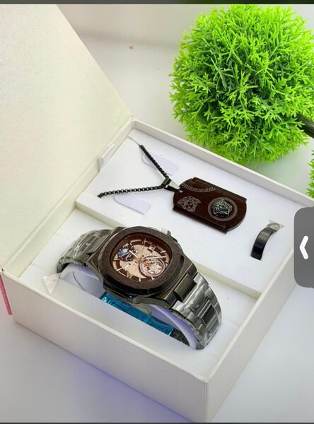 Montre homme luxe avec bracelet et pendentif