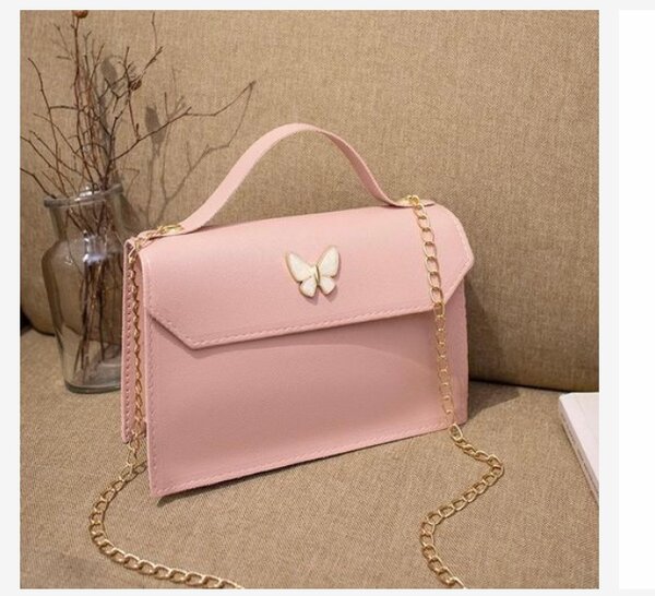 Sac à main rose papillon