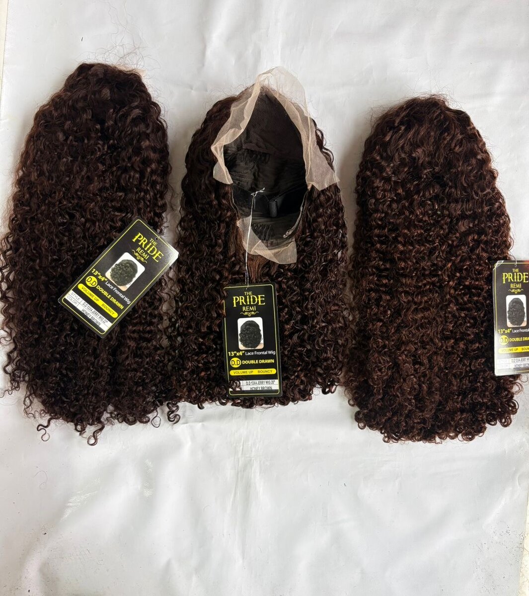 Perruques bouclées synthétiques