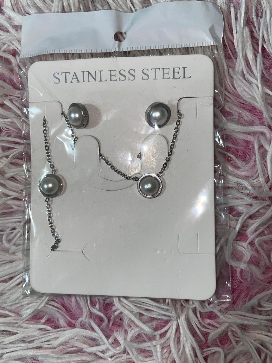 Parure acier croix moderne